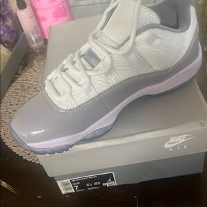 Nike Air Jordan 11 Low in White and Gray